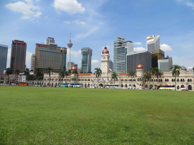 Green Merdeka Square with colonial buildings
