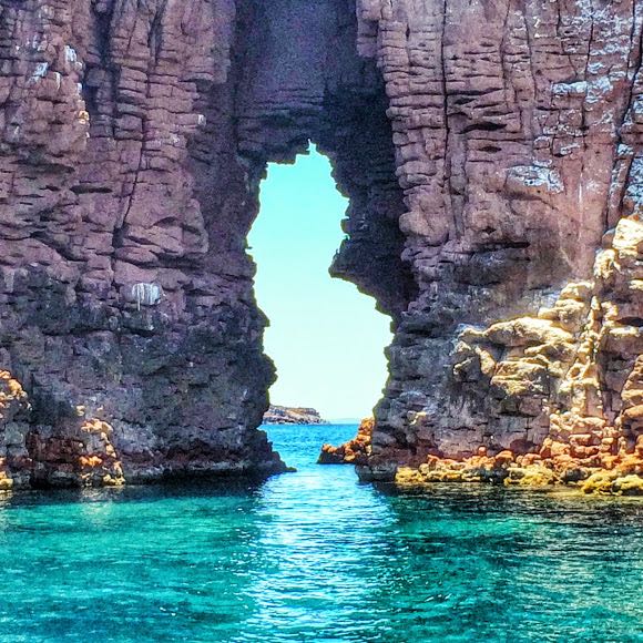 rock arch at sea near La Paz with turquoise water