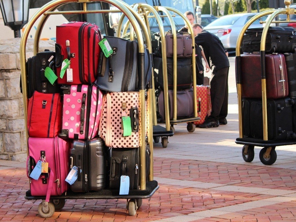 Travel Packing Above And Hands Of A Woman With Clothes Holiday Luggage And  Prepare For International Summer Suitcase Ready And Person Traveling With A  Suitcase Vacation Clothing And Hotel Bag Stock Photo 